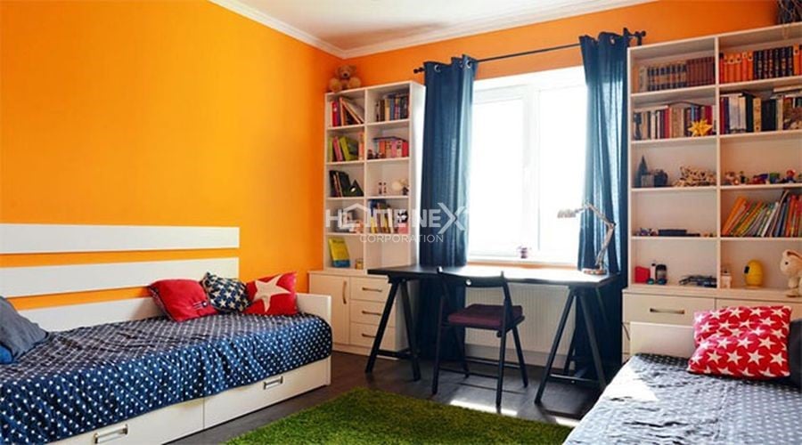 Màu Cam được nhiều gia đình lựa chọn làm màu sơn phòng ngủ cho con